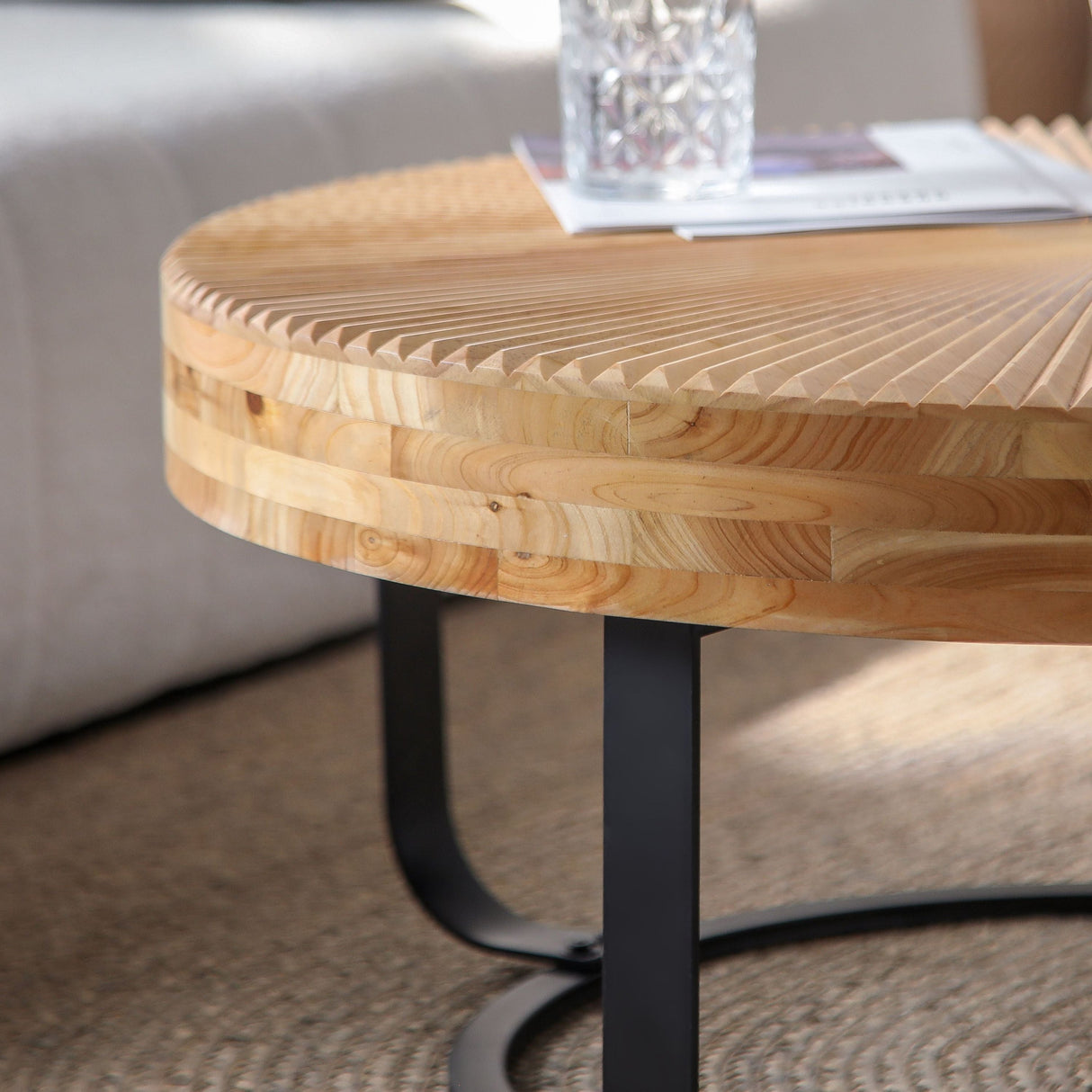 Modern Round Coffee Table with Wooden Carving Pattern and Metal Legs