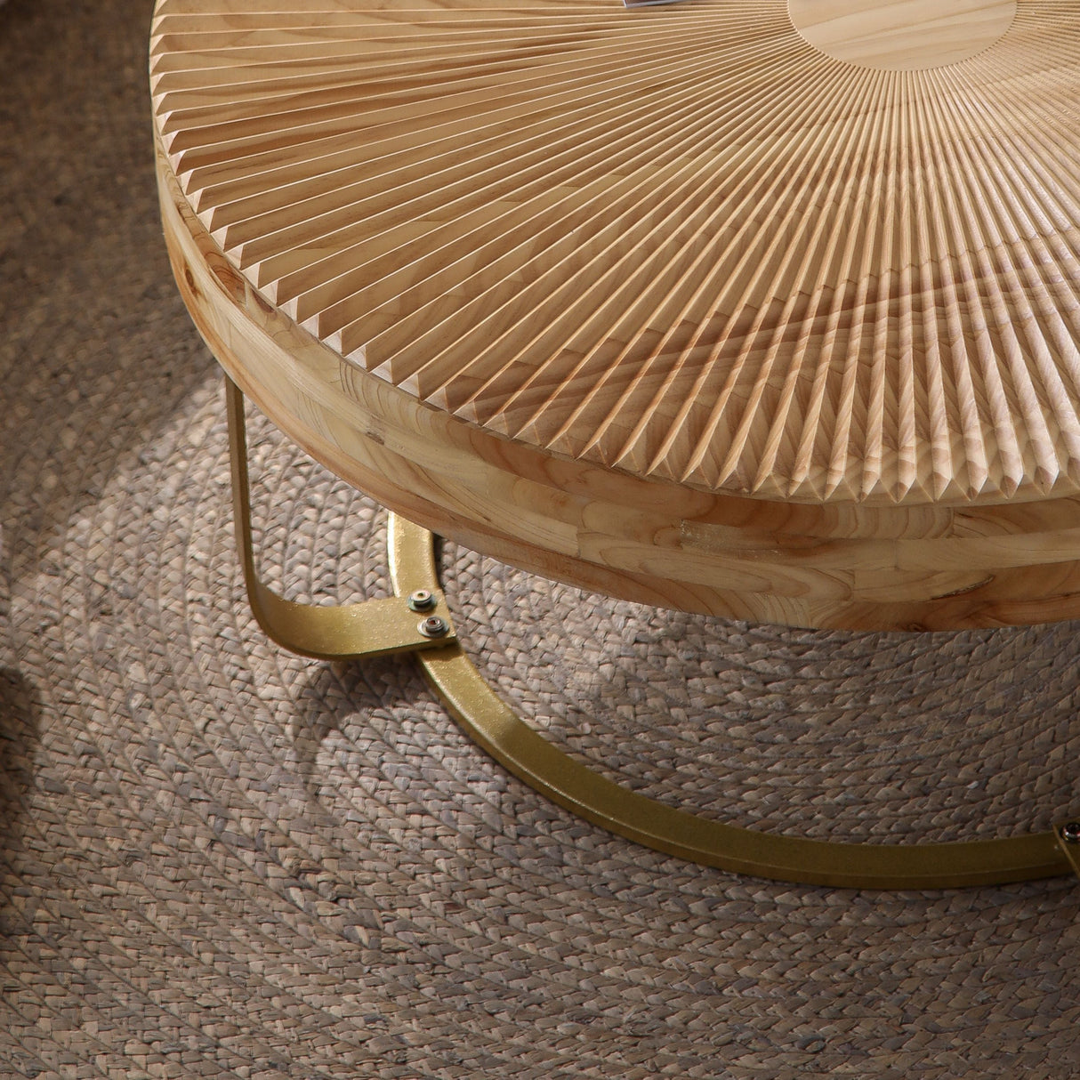 Modern Round Coffee Table with Wooden Carving Pattern and Metal Legs in Golden Natural Finish, Pine and MDF Construction