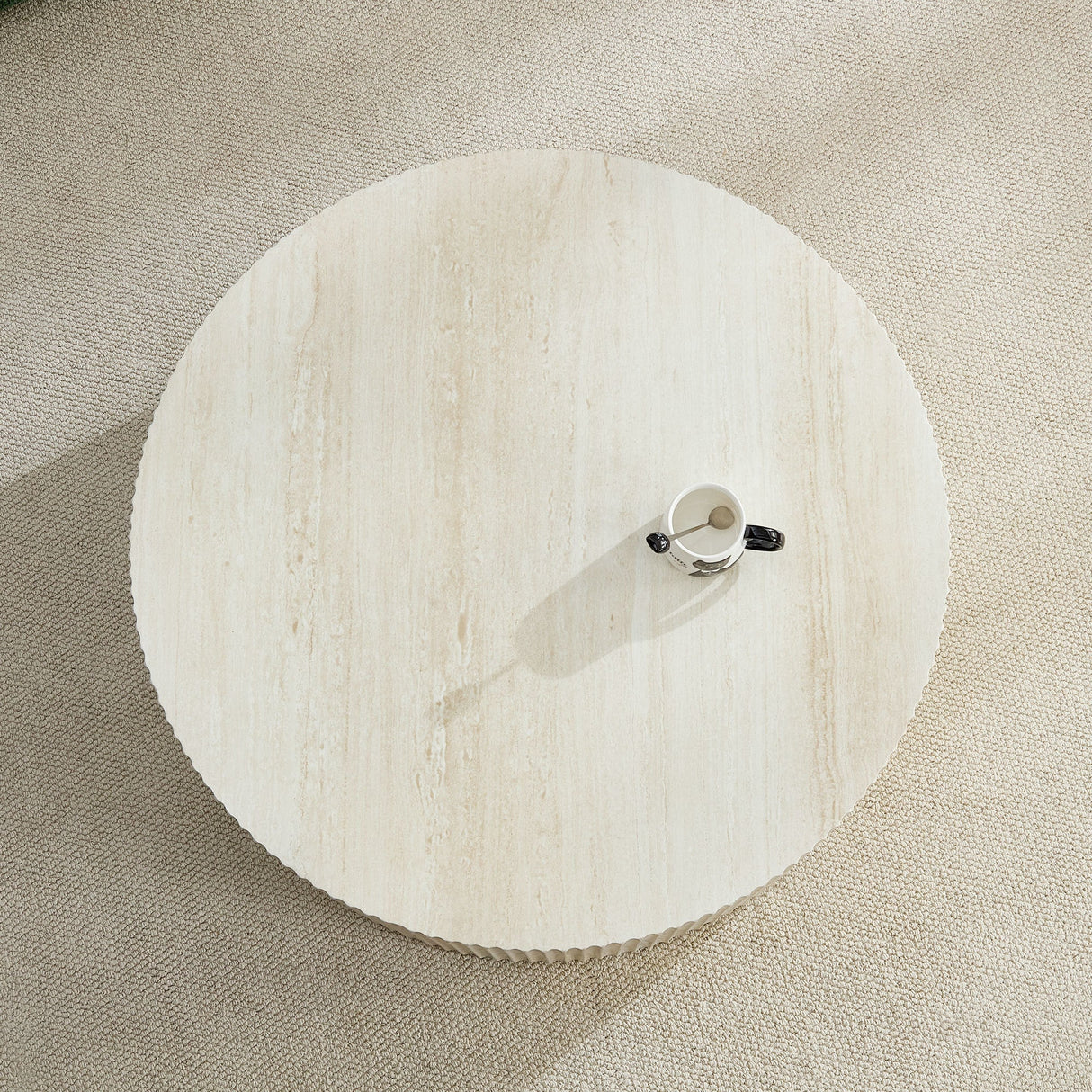 Faux Travertine Round Coffee Table with Eye-Catching Relief Design