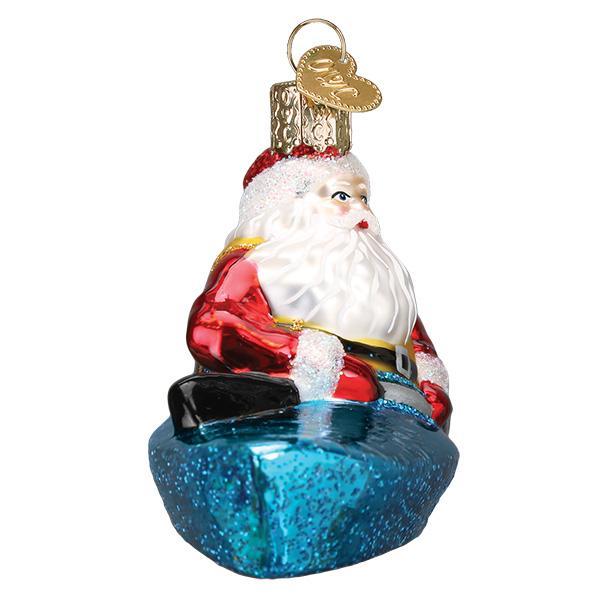 Santa In Kayak Ornament by Old World Christmas