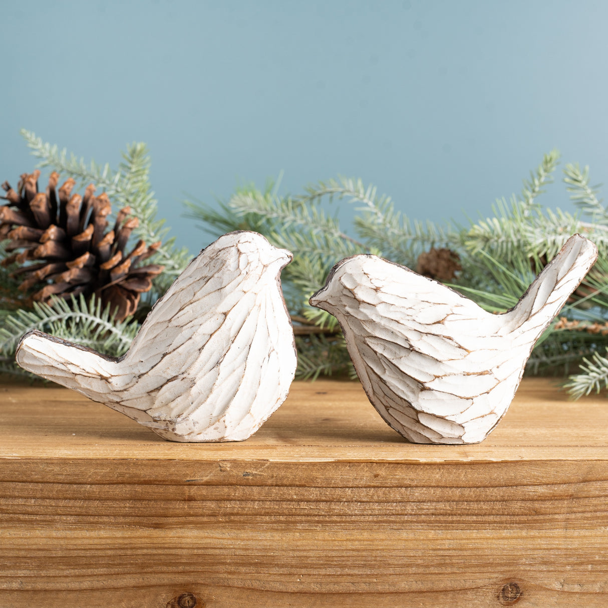 Carved bird figurine (set of 4)