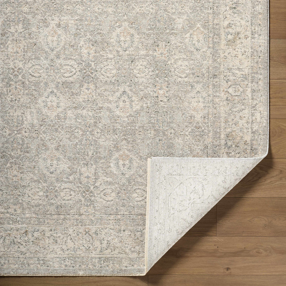 Buddug Cream Area Rug