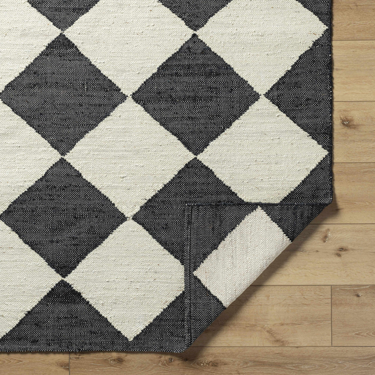 Andrin Black Area Rug