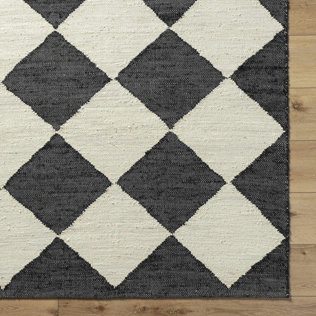 Andrin Black Area Rug