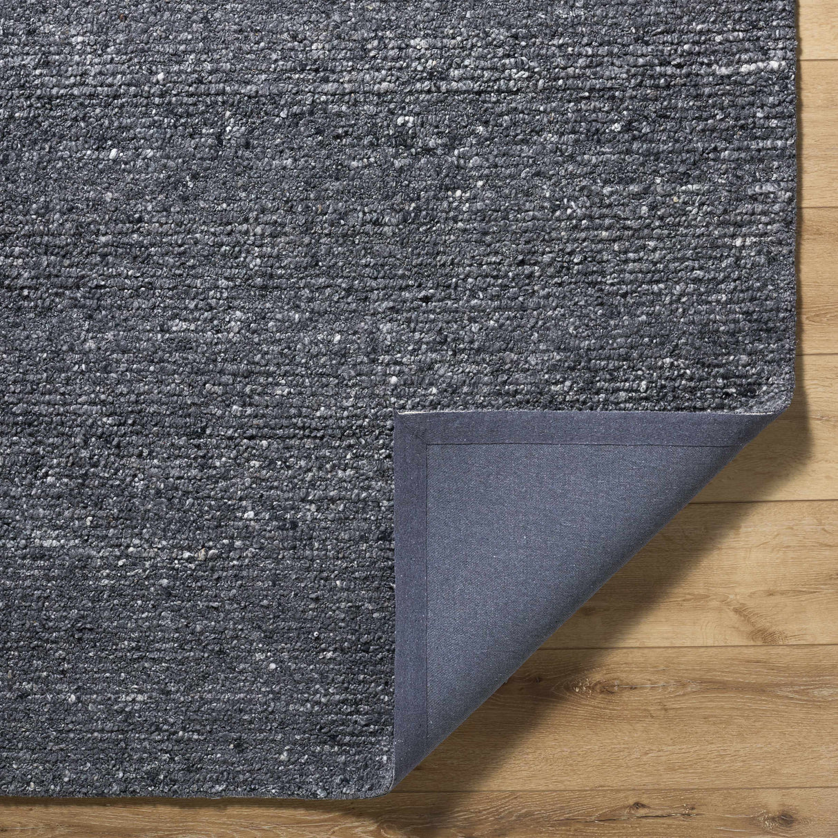 Winta Black Wool Area Rug