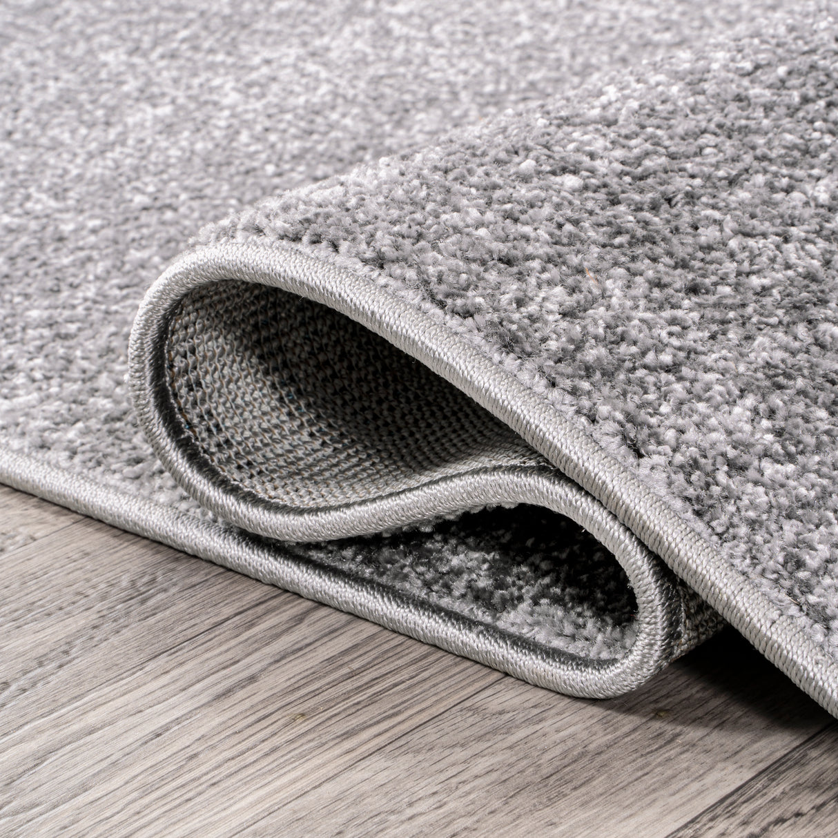 Haze Solid Sleek Low-Pile Oval Area Rug
