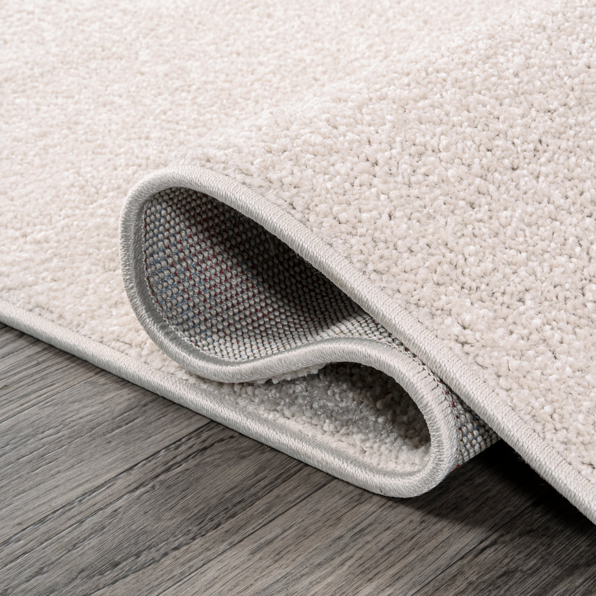Haze Solid Sleek Low-Pile Oval Area Rug