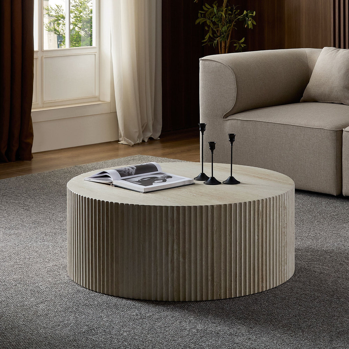 Faux Travertine Round Coffee Table with Eye-Catching Relief Design