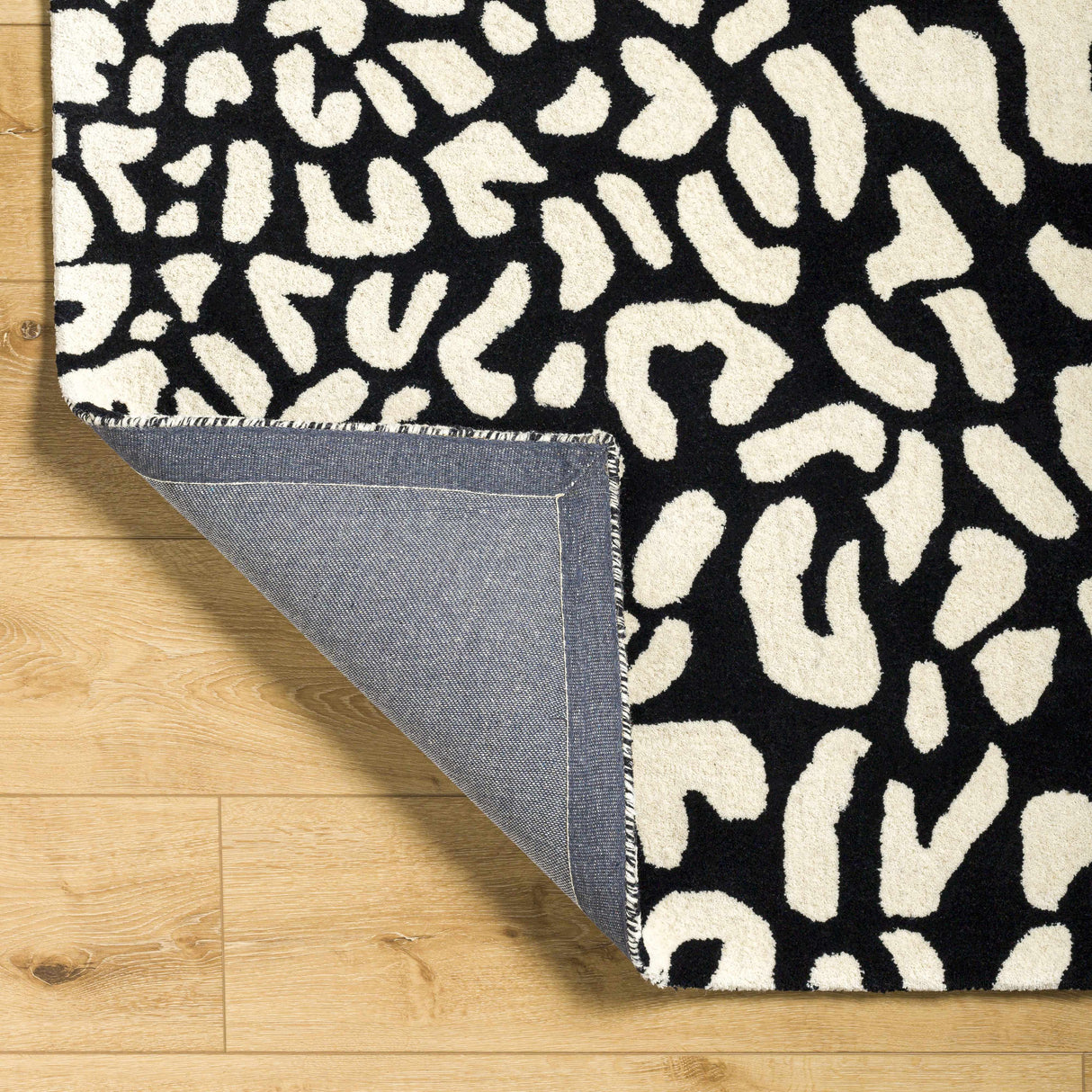 Akeem Leopard Print Area Rug - Clearance