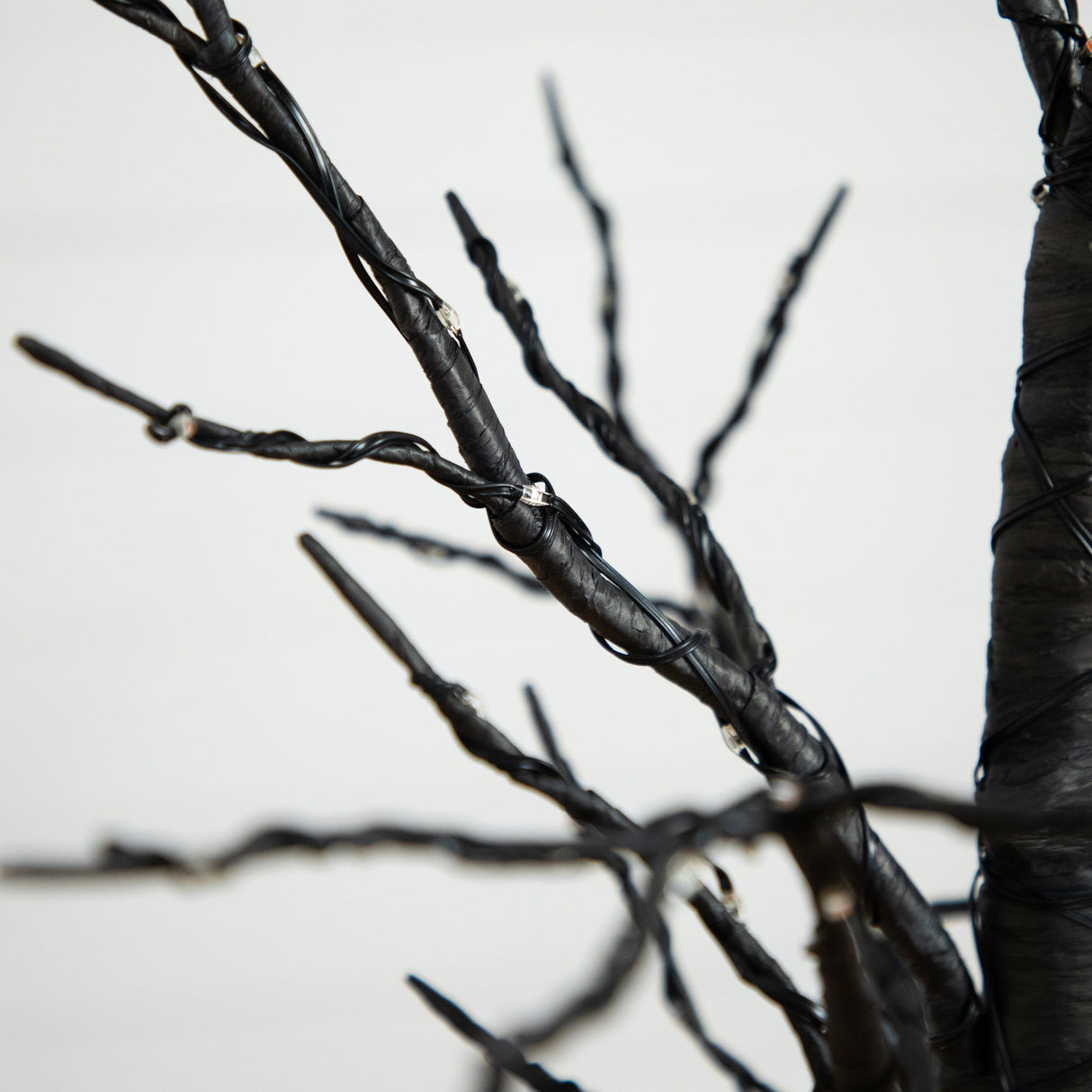 4’ Pre-Lit Artificial Halloween Twig Tree with 240 Orange & Purple LED Lights