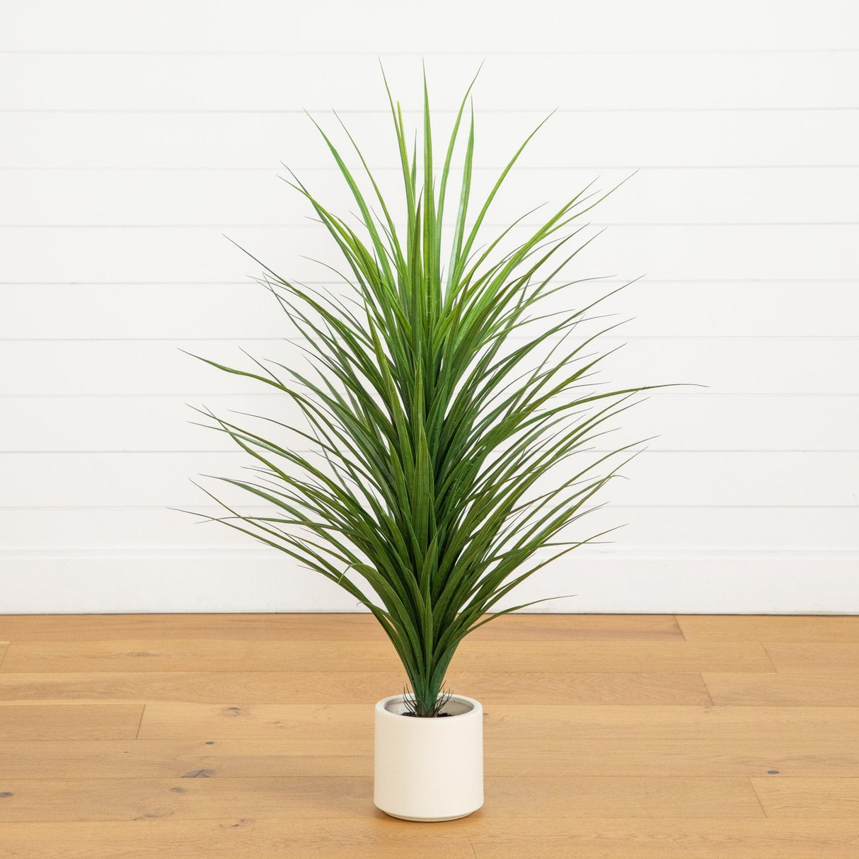 4’ UV Resistant Artificial Grass Plant in White Decorative Planter (Indoor/Outdoor)