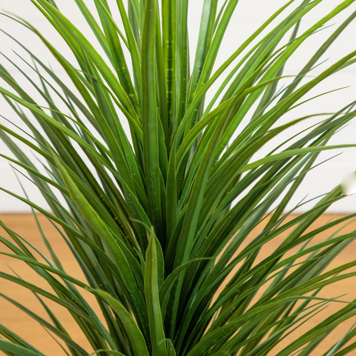 4’ UV Resistant Artificial Grass Plant in White Decorative Planter (Indoor/Outdoor)