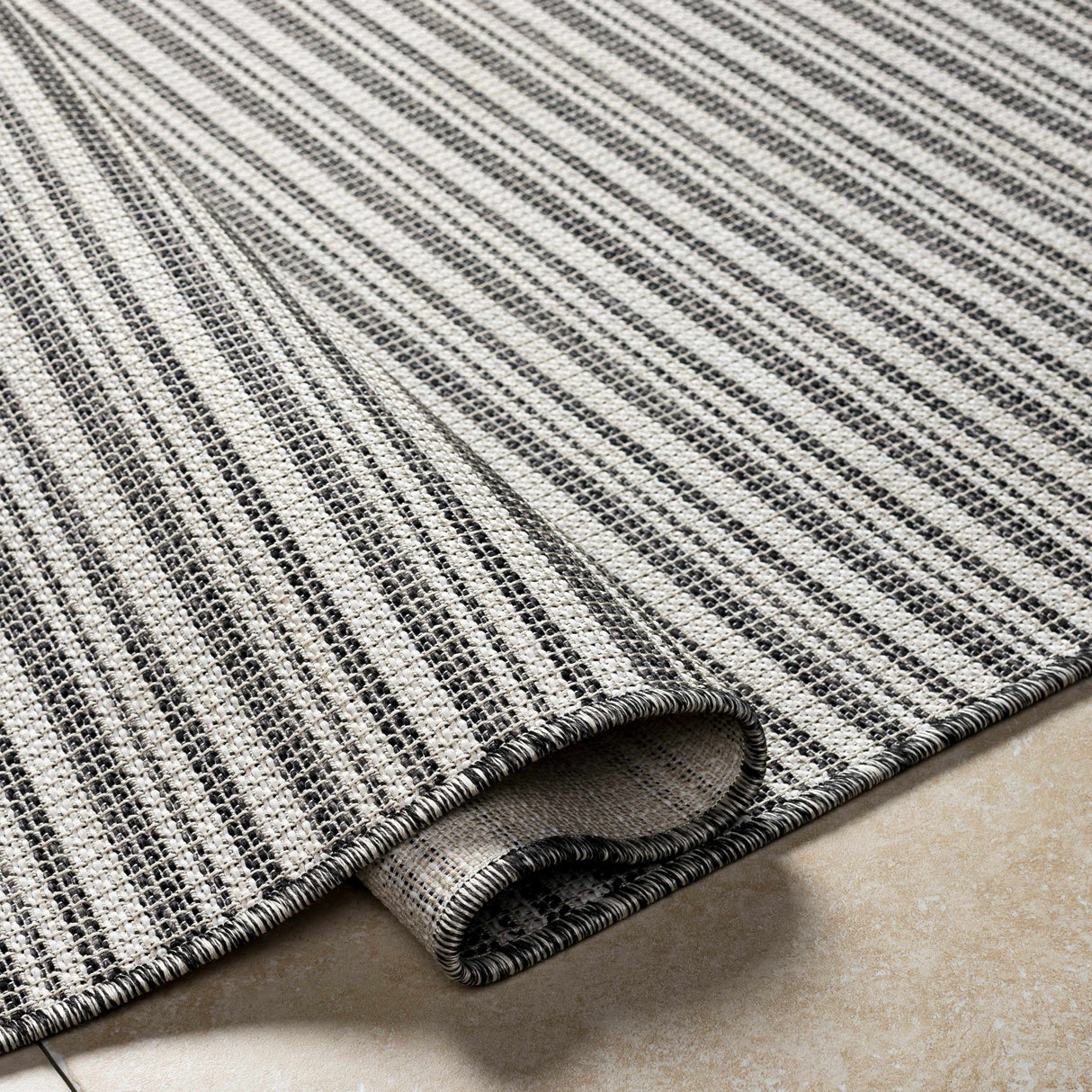 Greg Black Area Rug - Clearance