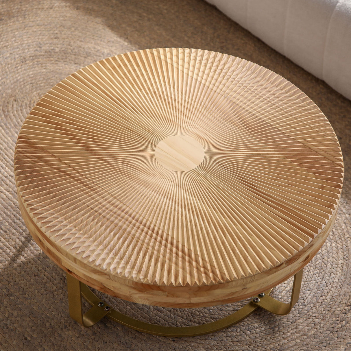 Modern Round Coffee Table with Wooden Carving Pattern and Metal Legs in Golden Natural Finish, Pine and MDF Construction