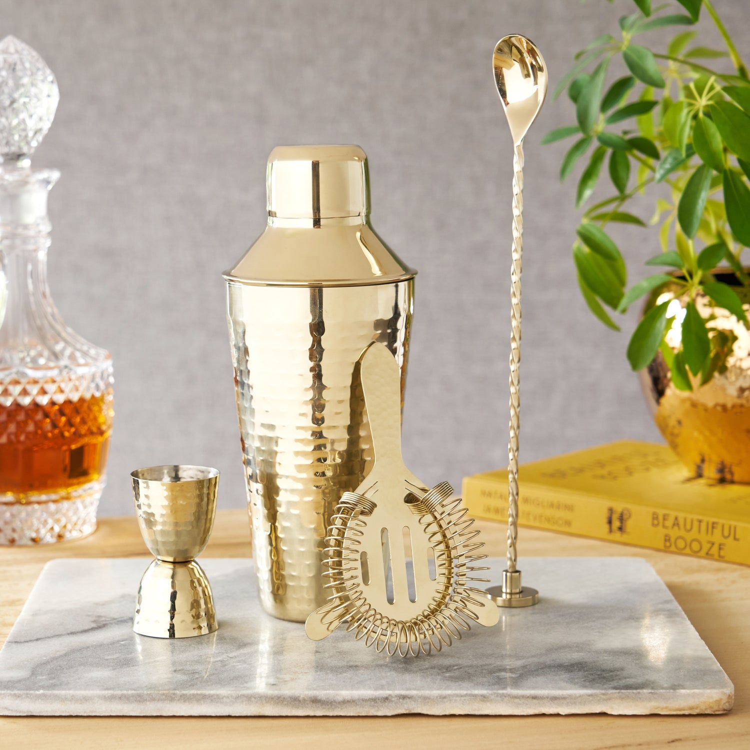 Gold hammered barware set by twine
