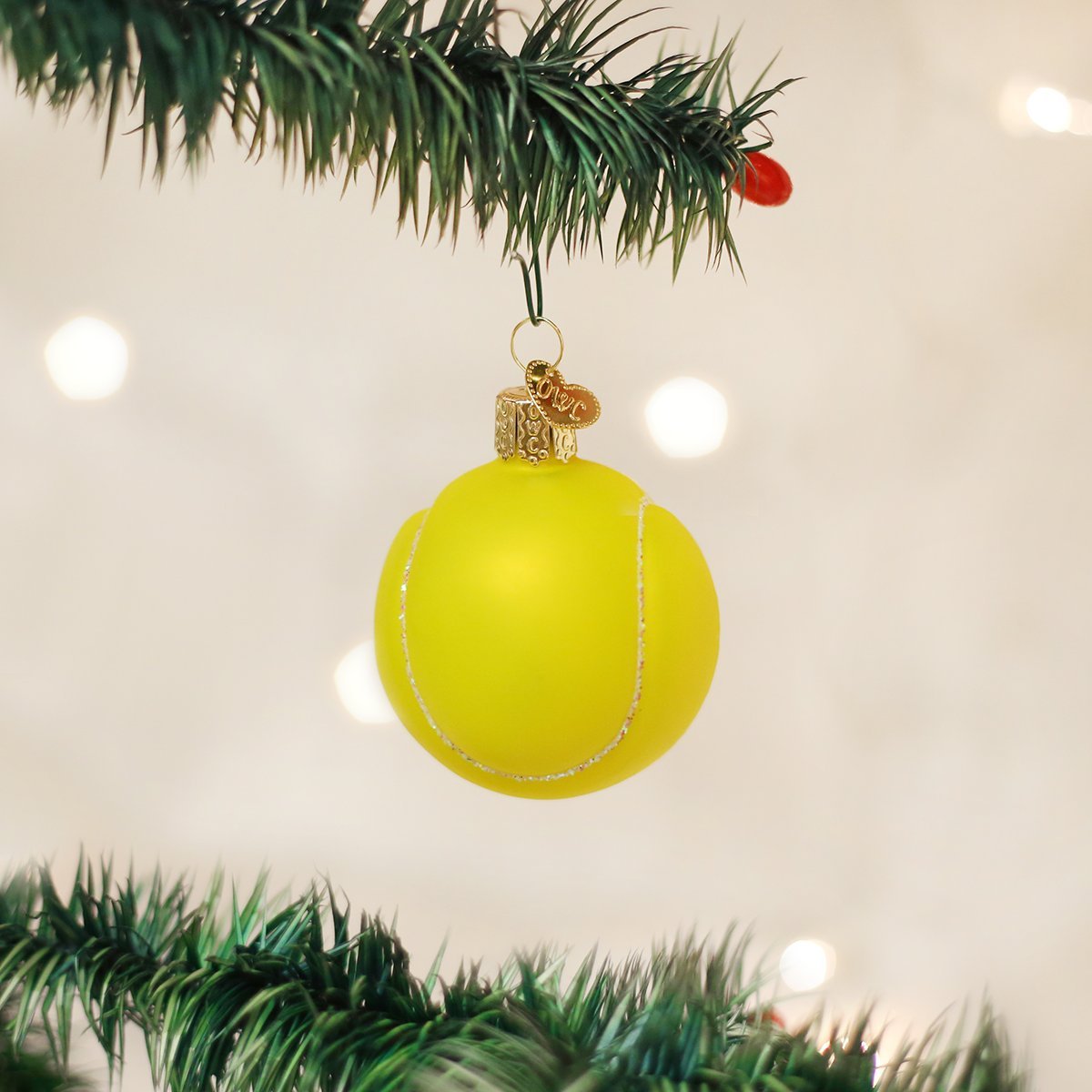 Old World Christmas Tennis Ball Glass Ornament