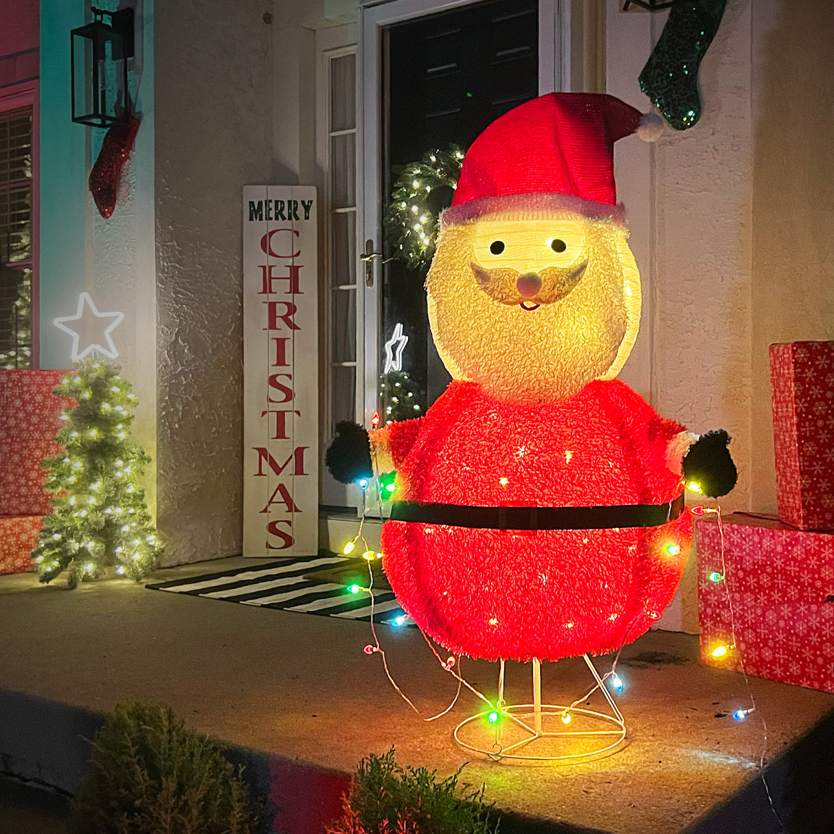 4-Ft. Prelit Collapsible Tinsel Santa Indoor or Outdoor Decoration