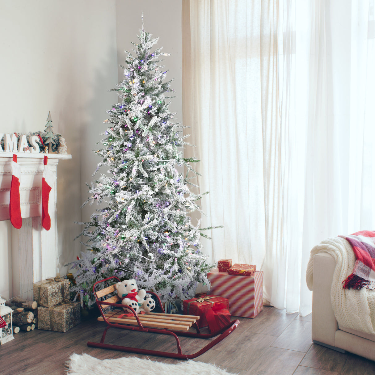 Fraser Hill Farm 9-Ft Flocked Mountain Pine Artificial Christmas Tree with Dual Multicolor & Warm White LED Lights