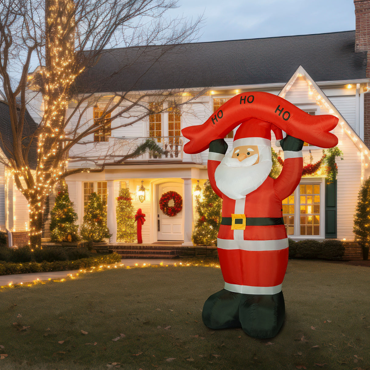 10-Ft. Tall Santa Holding HO HO HO Sign, Outdoor Blow-Up Christmas Inflatable with Lights and Storage Bag