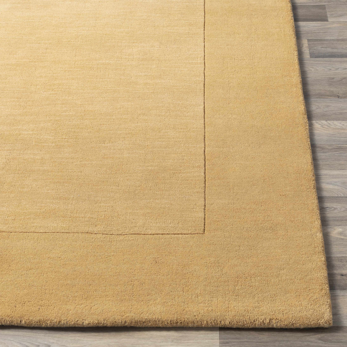 Bordered Solid Camel Yellow Wool Rug