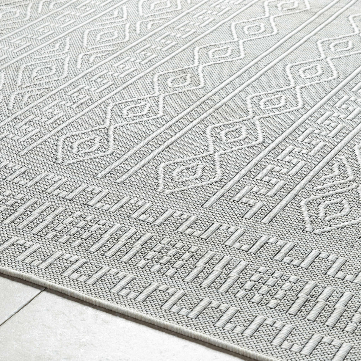 Nuela Light Gray Area Rug - Clearance