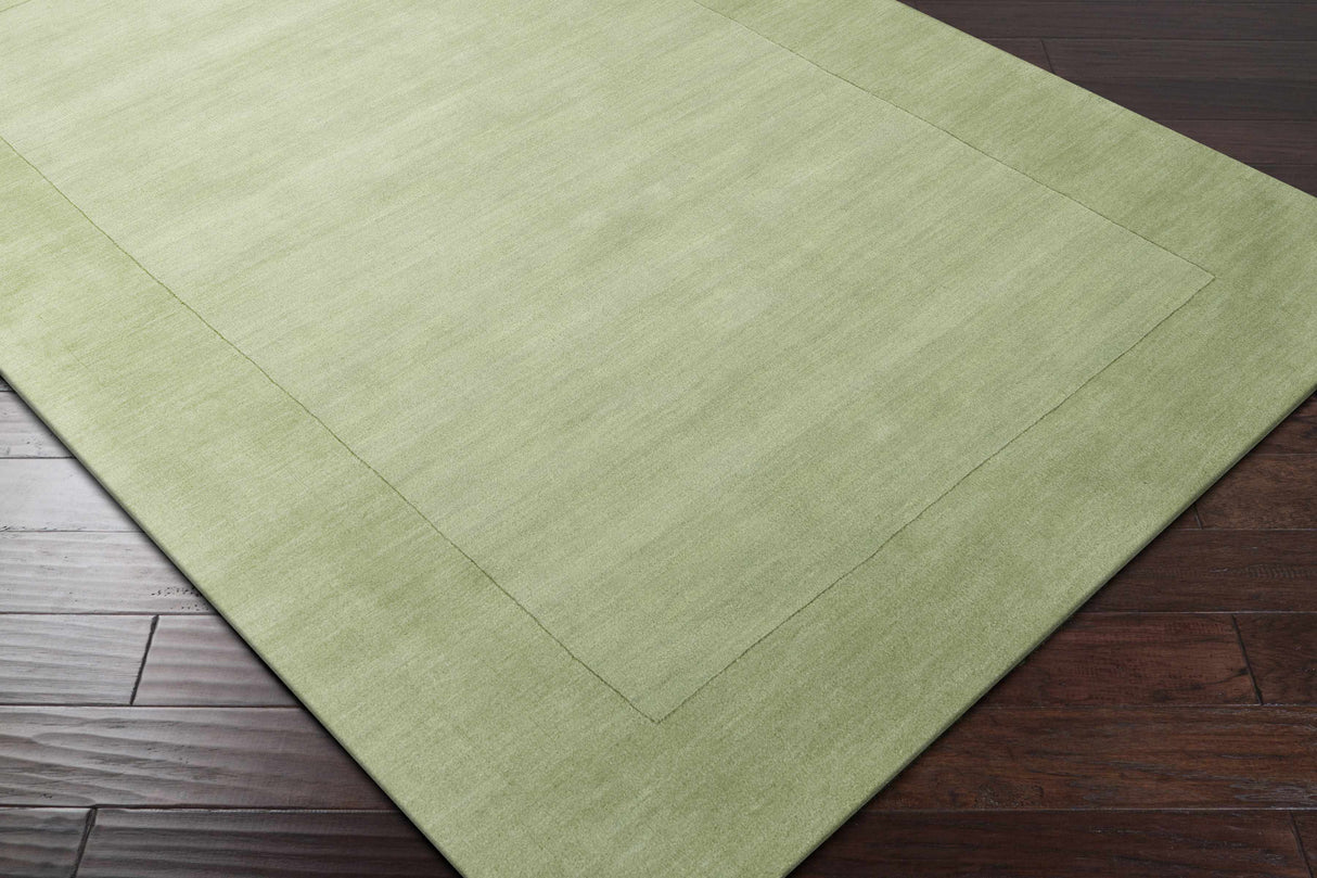 Bordered Solid Green Wool Rug