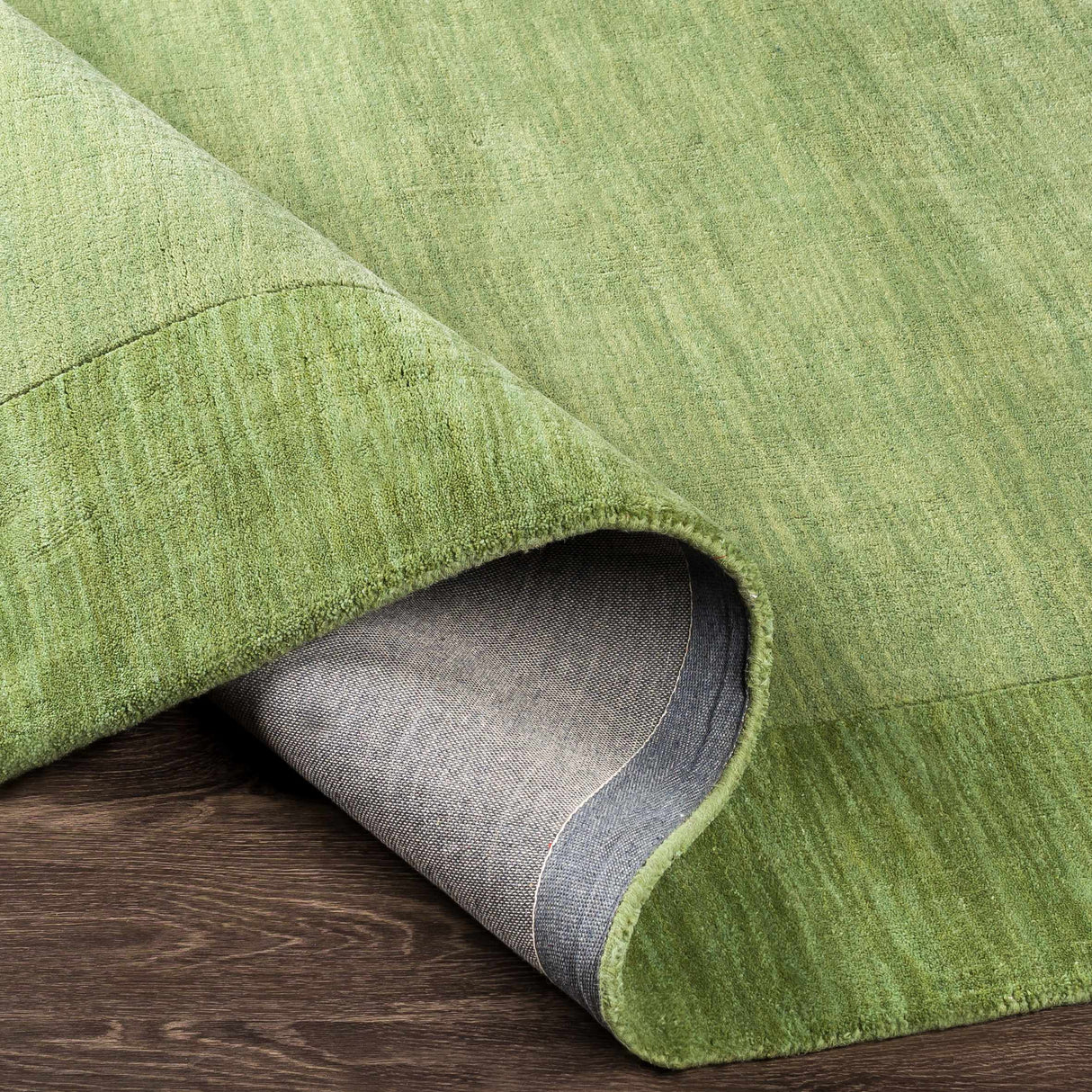 Bordered Solid Green Wool Rug