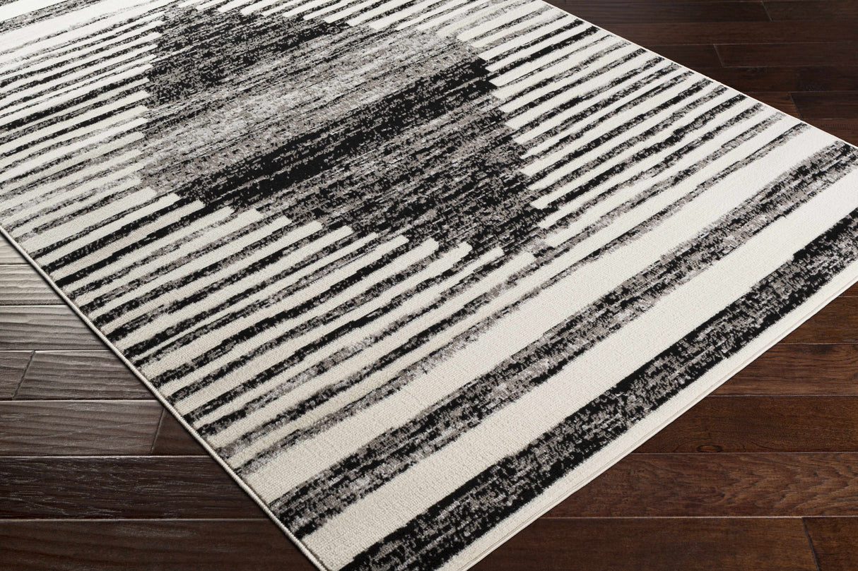 Resolven Area Rug - Clearance