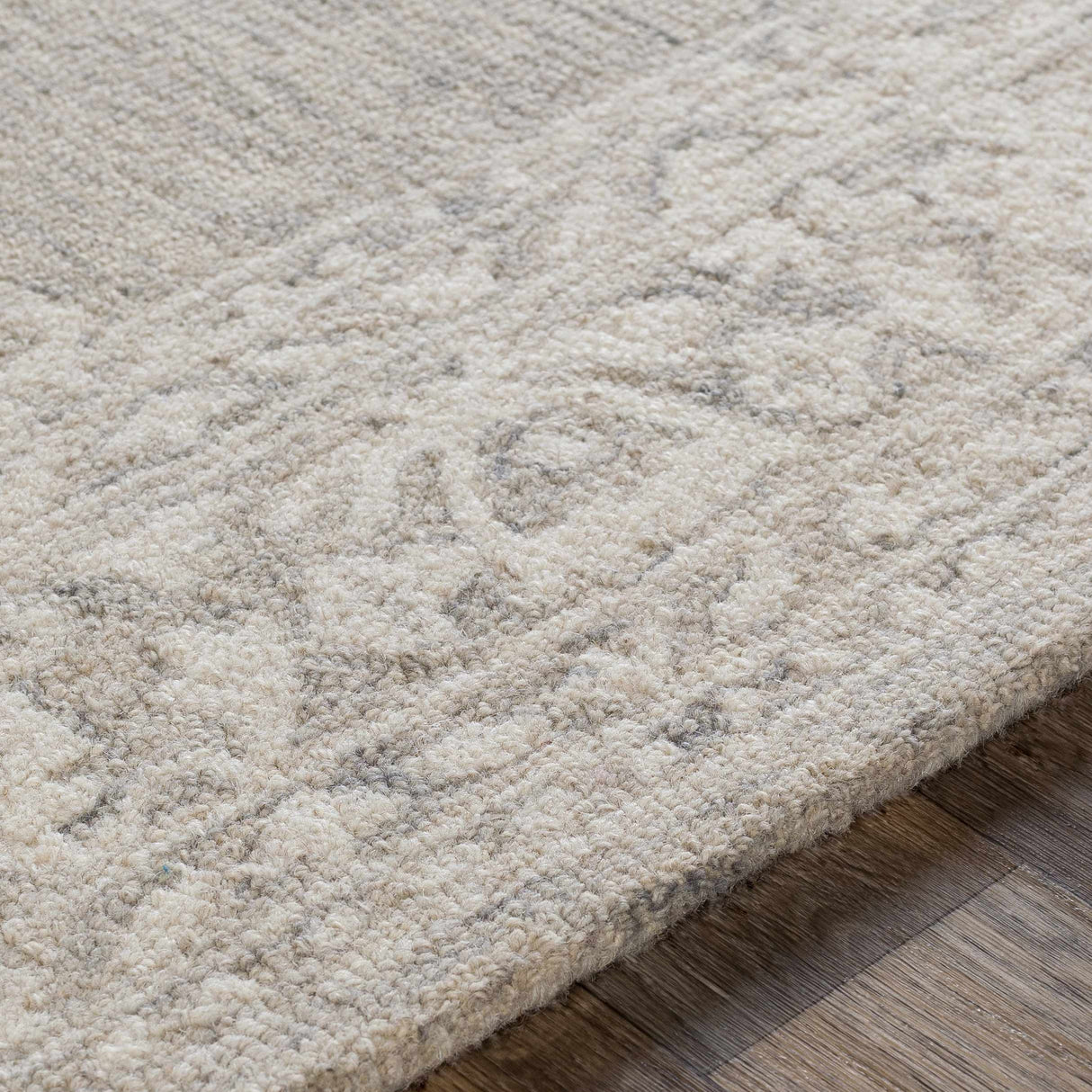Roessleville Cream Wool Area Rug