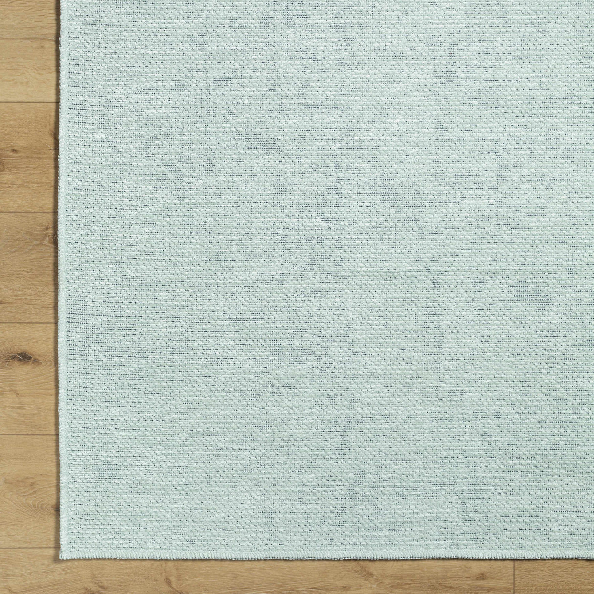 Isako Seafoam Solid Washable Area Rug - Clearance