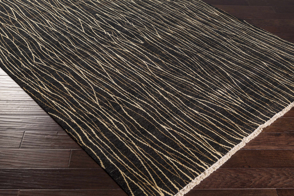 Olavi Black Area Rug - Clearance