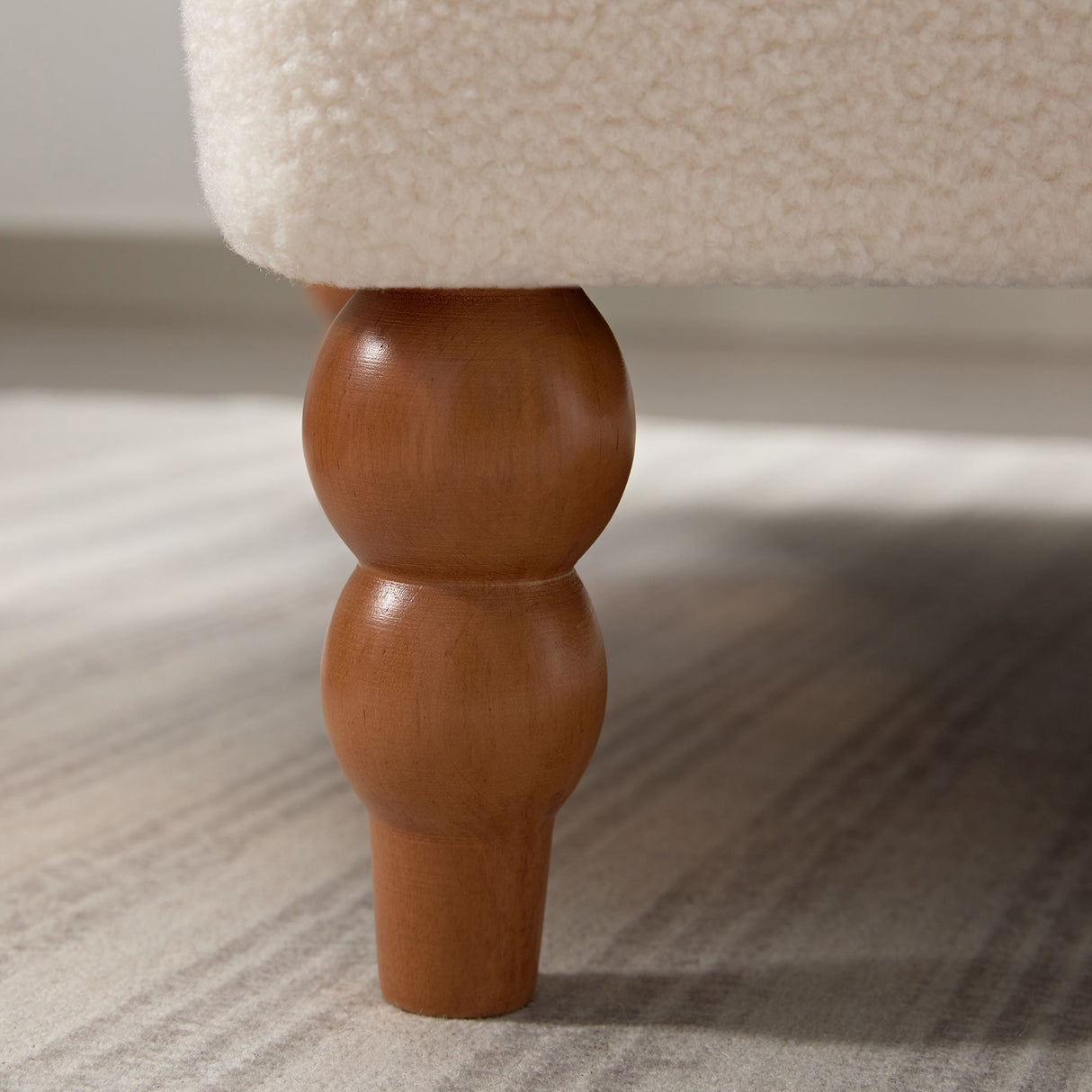 Upholstered Accent Chair with Circular Armrests and Roman Column Legs - Accent Chairs