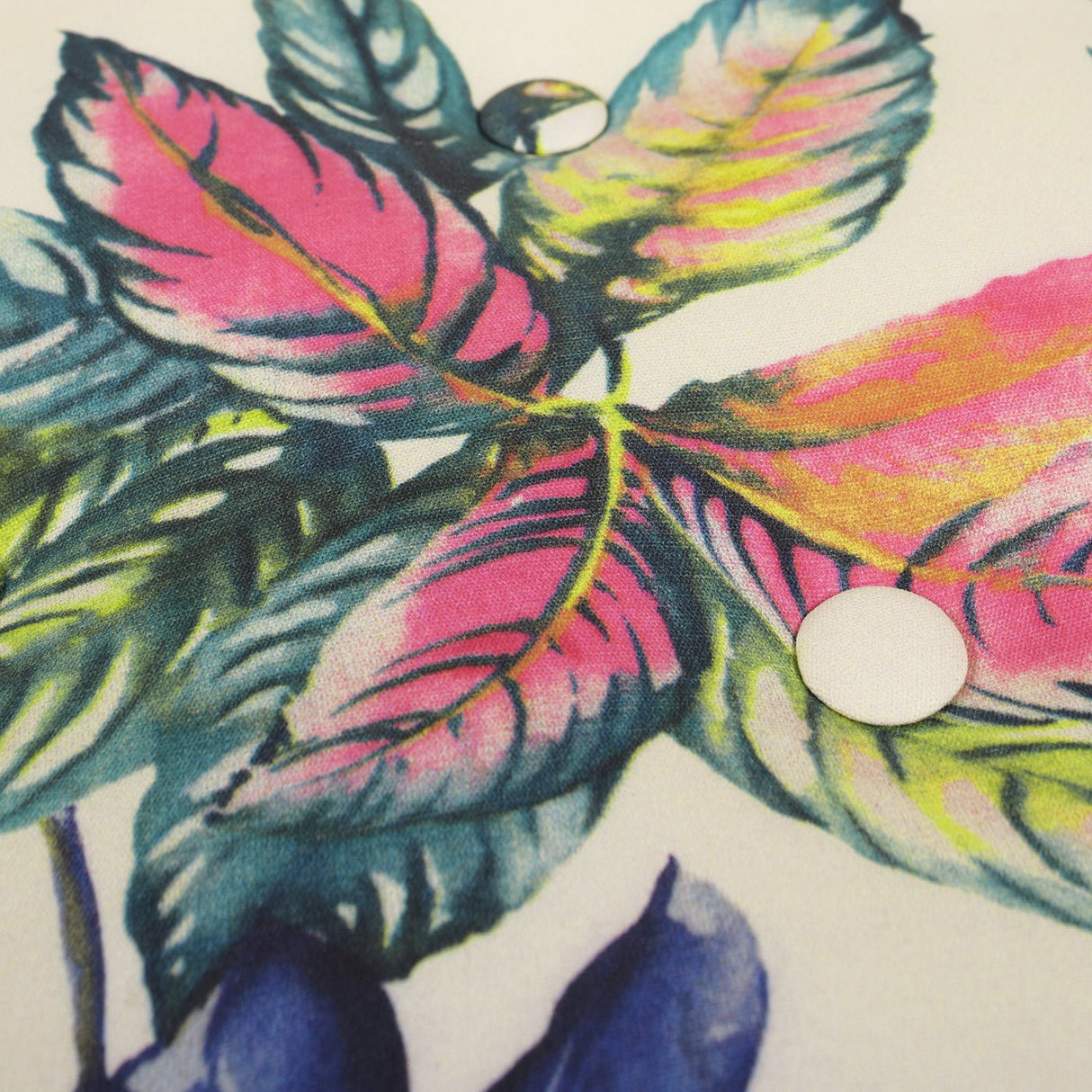 Yolanda 24" round upholstered accent ottoman, beige & tropical floral with ivory trim - Tuesday Morning - Ottomans