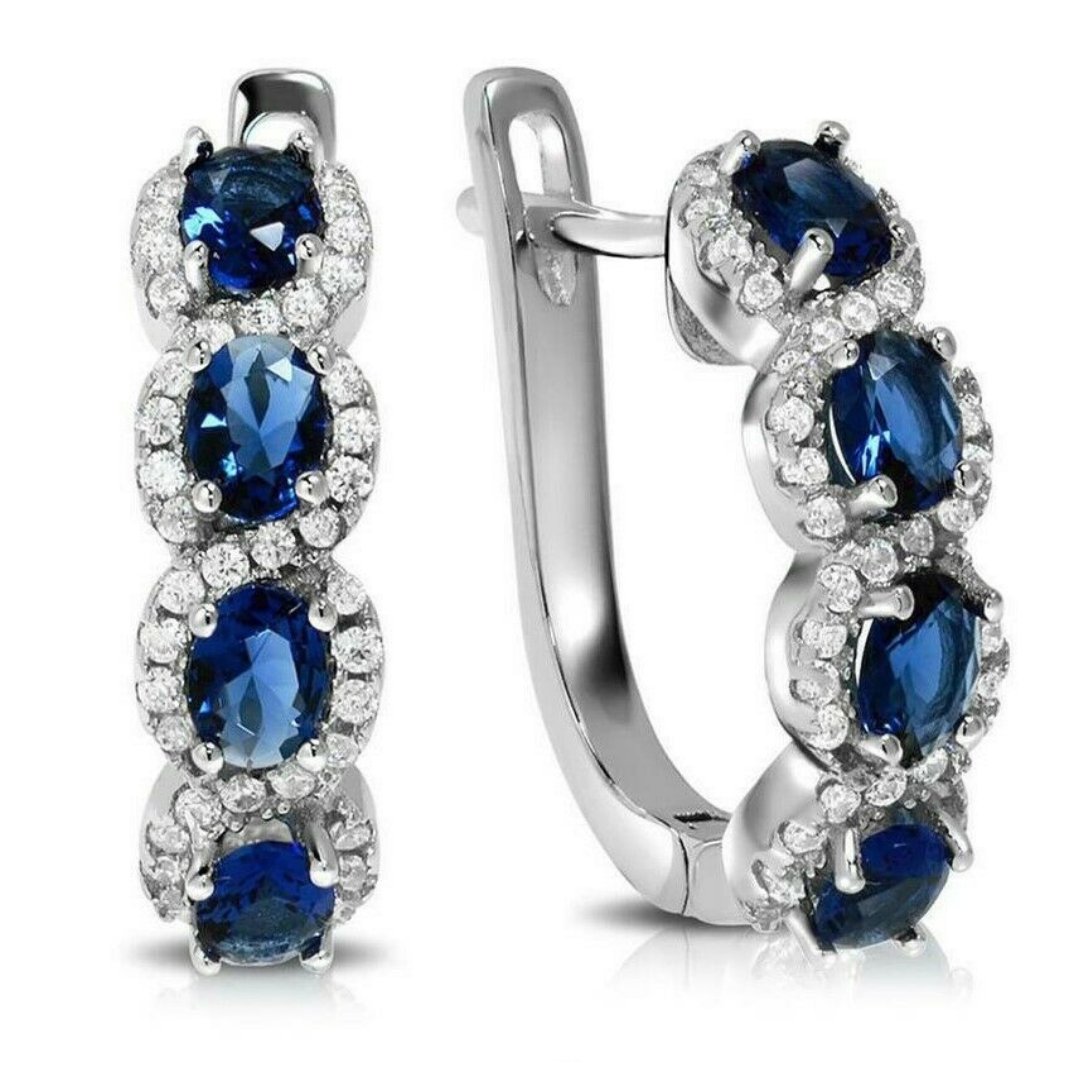 Blue-&-White-Sapphire-Halo-Huggie-Earrings-in-18K-White-Gold-Earrings