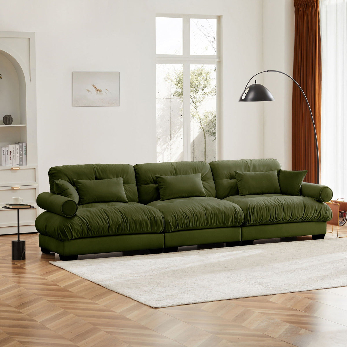 Modern Sofa With Bolstered Armrests And Pillows