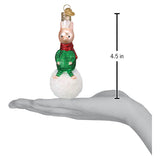 Piglet On Snowball Christmas Ornament