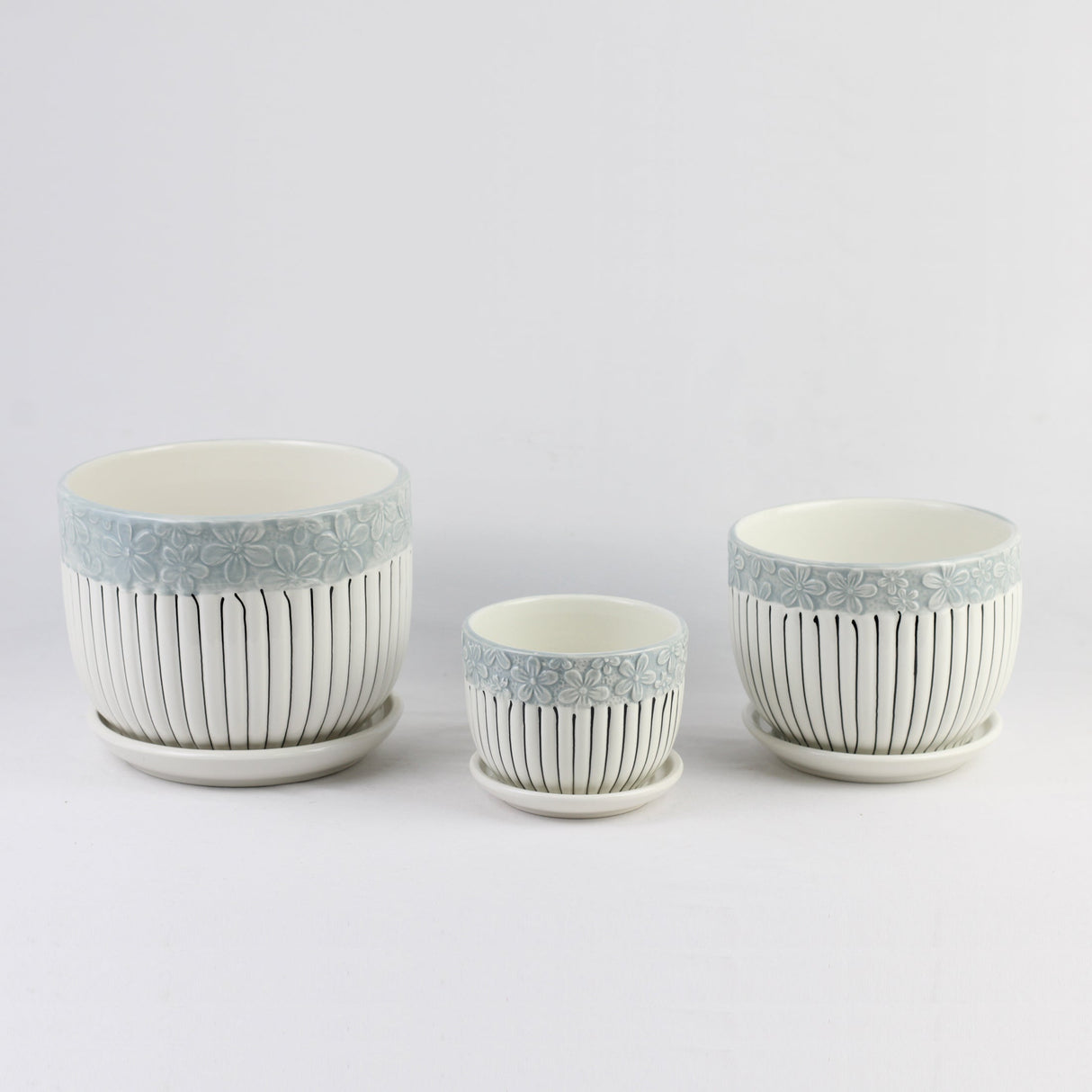 3-Piece Ceramic Planter Pot Set with Embossed Floral Rim and Saucers