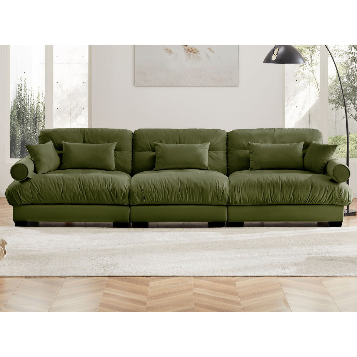 Modern Sofa With Bolstered Armrests And Pillows