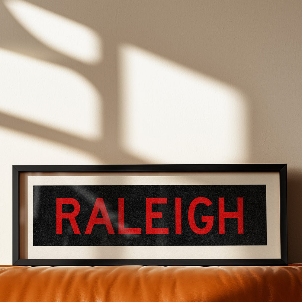 Framed Raleigh Red and Black Bus Scroll