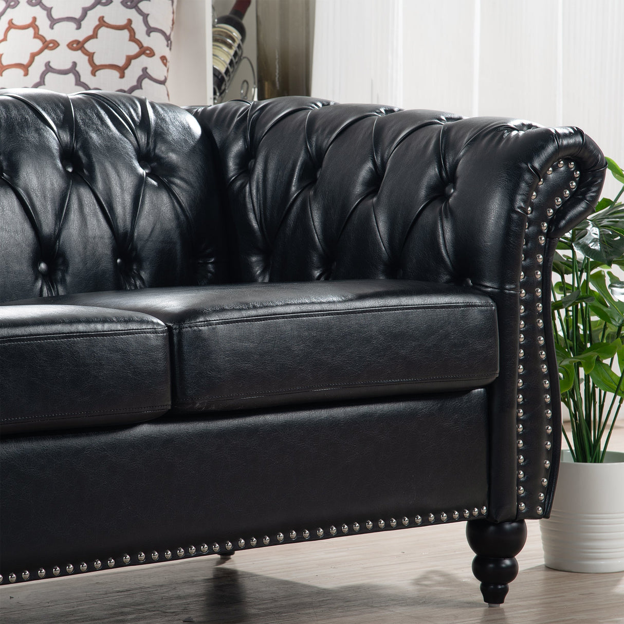 84.65' Black PU Rolled Arm Chesterfield Three Seater Sofa