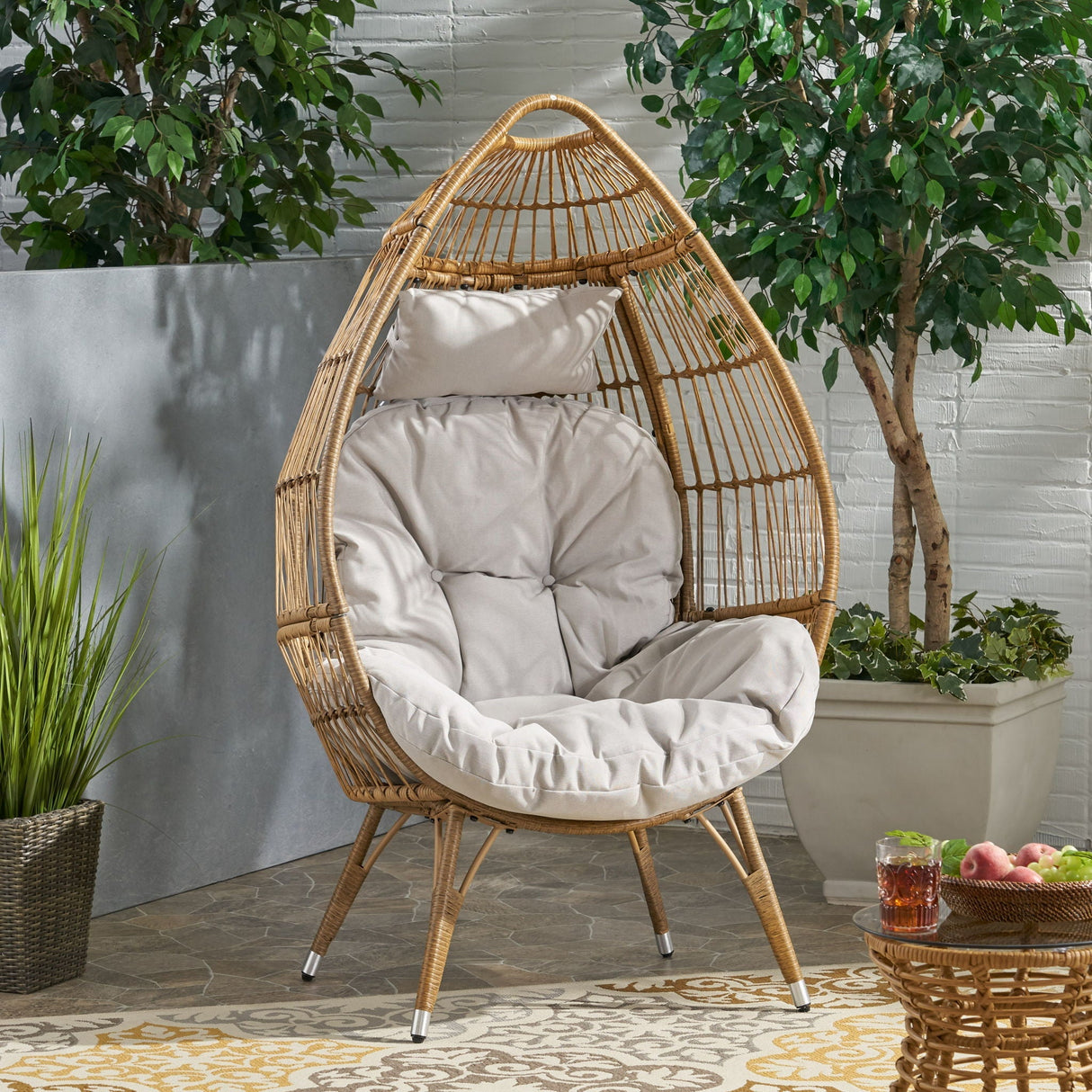 Basket Chair with Teardrop Shape and Water Resistant Cushion - Natural