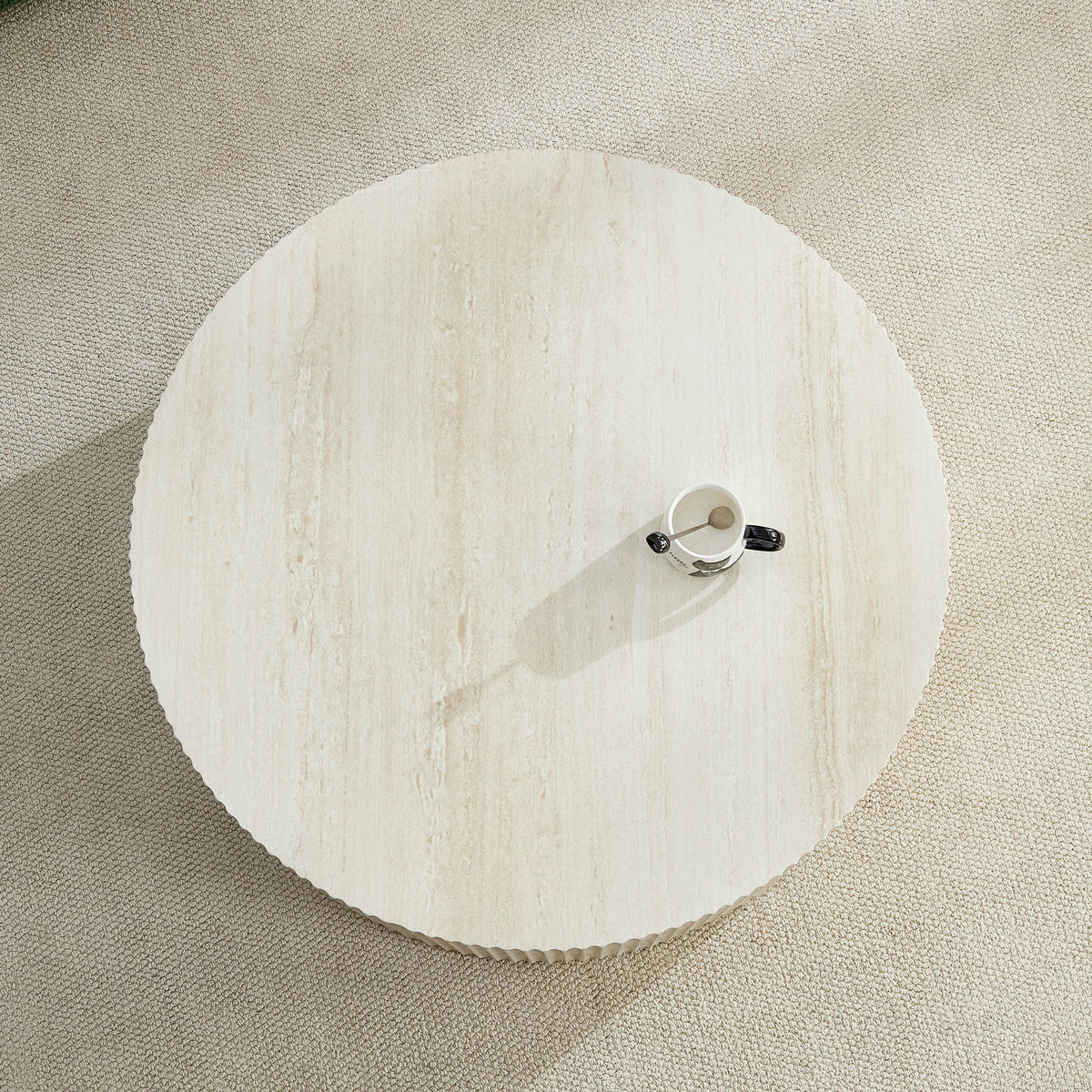 Faux Travertine Round Coffee Table with Eye-Catching Relief Design