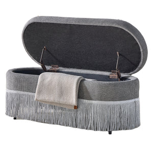 Oval Upholstered Storage Ottoman with Fringe Trim
