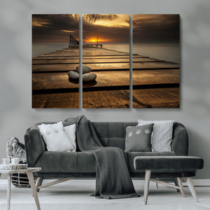 Stones on Wooden Pier at Sunset Canvas Print, Serene Coastal