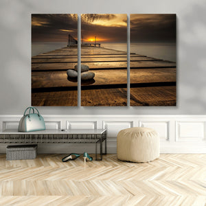 Stones on Wooden Pier at Sunset Canvas Print, Serene Coastal