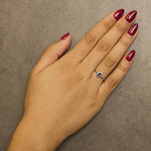 10K White Gold 5X3MM Oval Birthstone and Diamond Accent Halo Ring