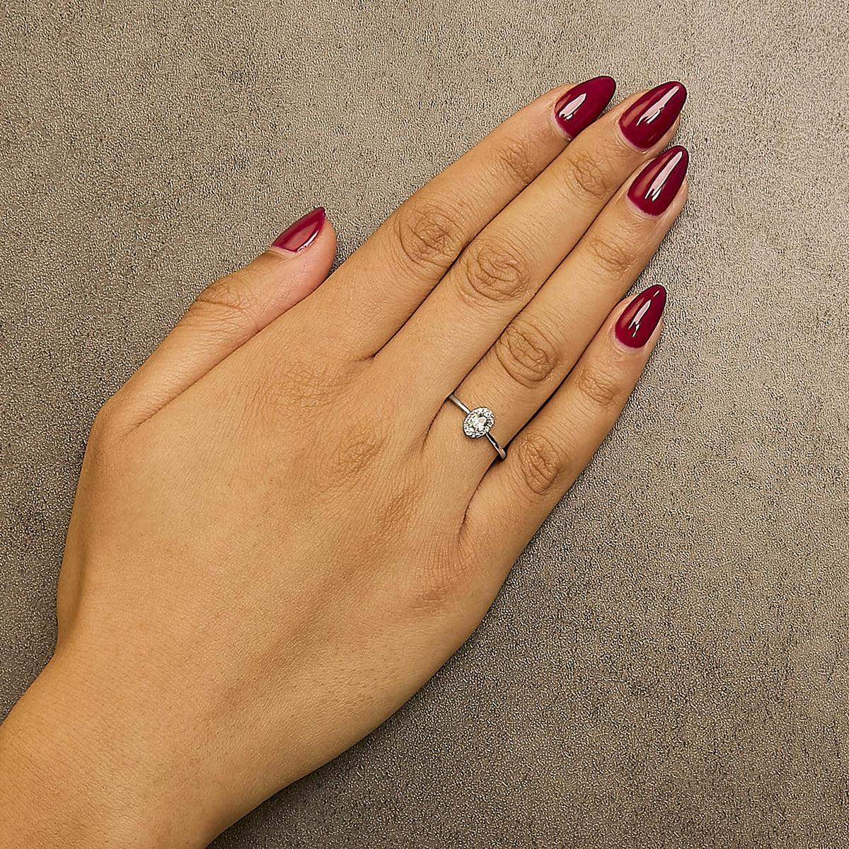 10K White Gold 5X3MM Oval Birthstone and Diamond Accent Halo Ring
