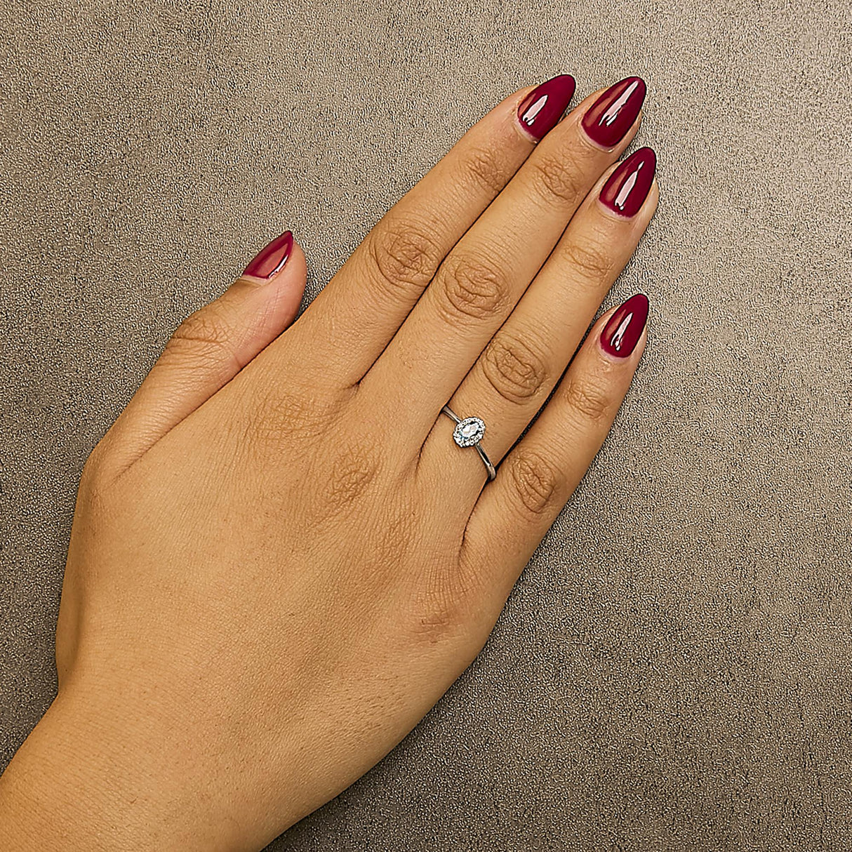 10K White Gold 5X3MM Oval Birthstone and Diamond Accent Halo Ring
