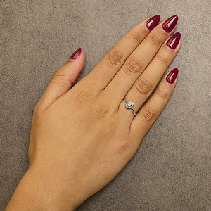 10K White Gold 5X3MM Oval Birthstone and Diamond Accent Halo Ring