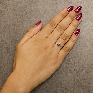 10K White Gold 5X3MM Oval Birthstone and Diamond Accent Halo Ring